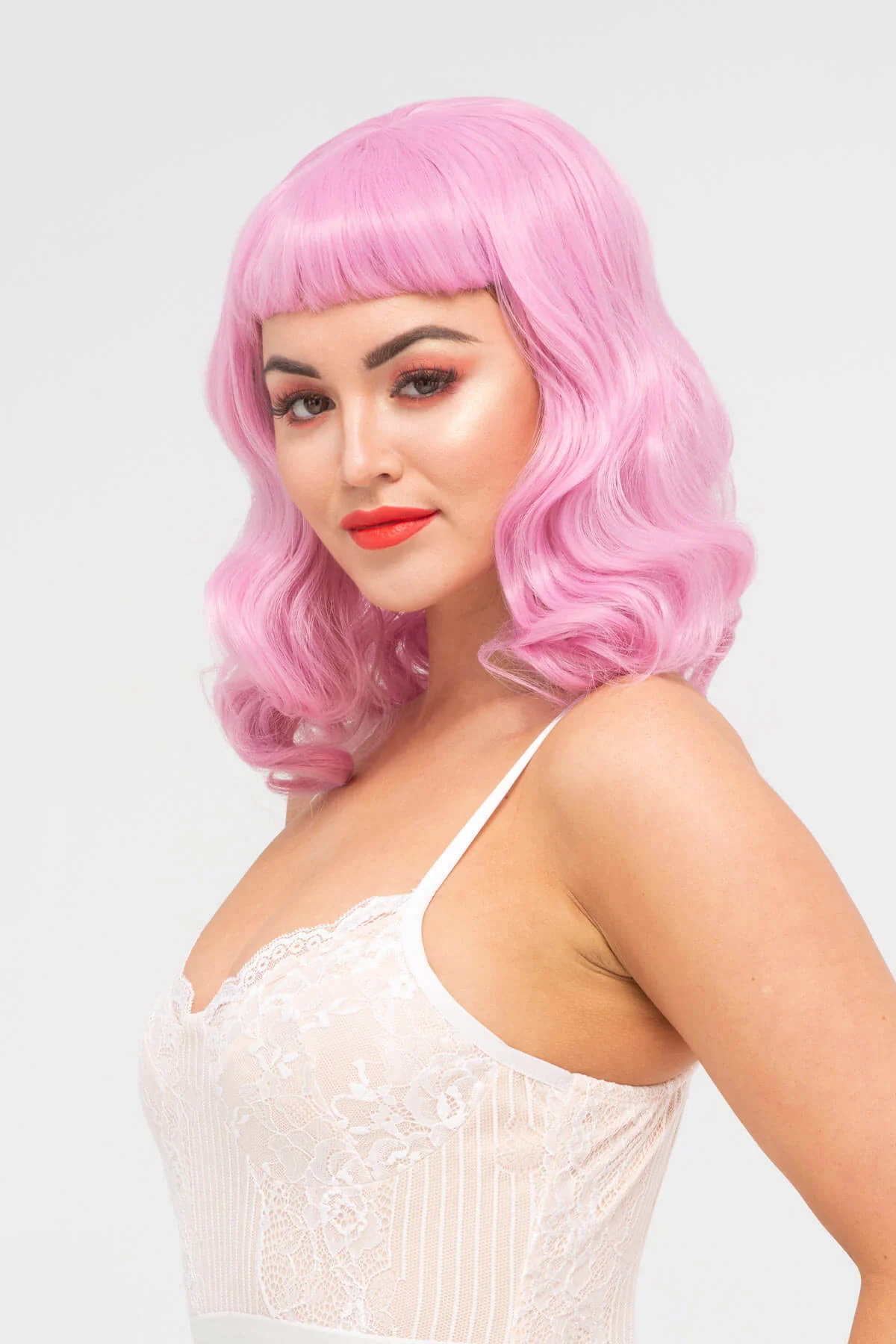 Pink pinup style wig, with finger waves and a short fringe: Stevie - Image 16