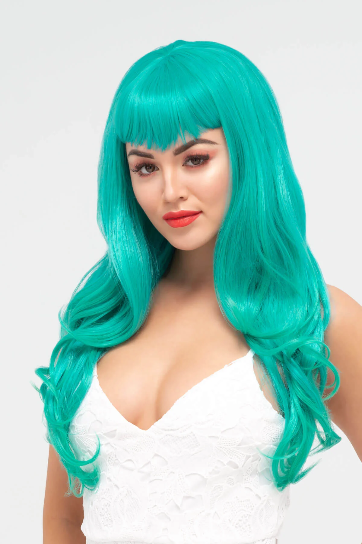 Long aqua green wig with gentle waves and vintage-style straight fringe: Natalie