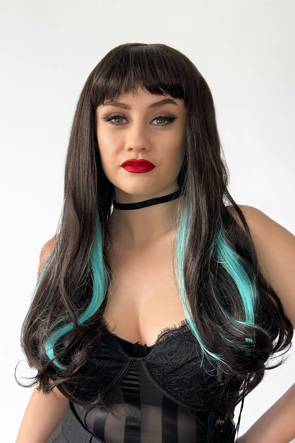 Long dark brown wig with blue streaks and a straight fringe: Cyane